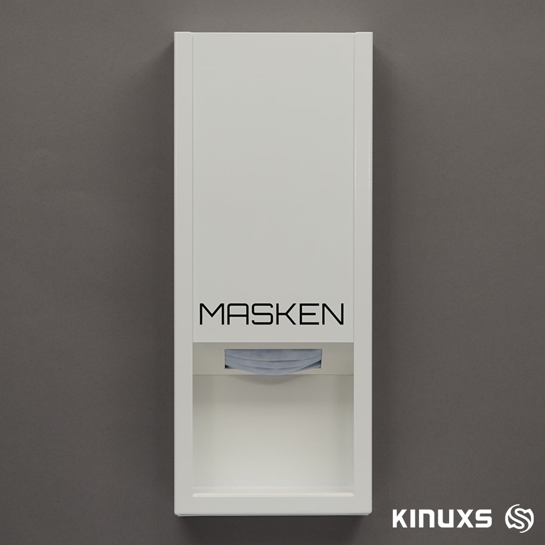 Weißer design Maskenspender für Wandmontage der Marke Kinuxs zur kontaktlosen Entnahme von OP Masken. Ansicht von vorne mit Kinuxs-Logo.